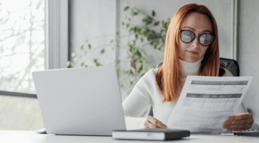 Business-Woman-Reviewing-Documents