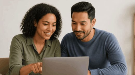 Couple-reviewing-benefits-enrollment-on-laptop-1600-600