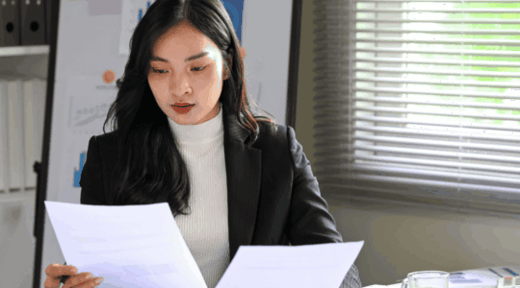 Executive-reviewing-policy-updates-1600x600