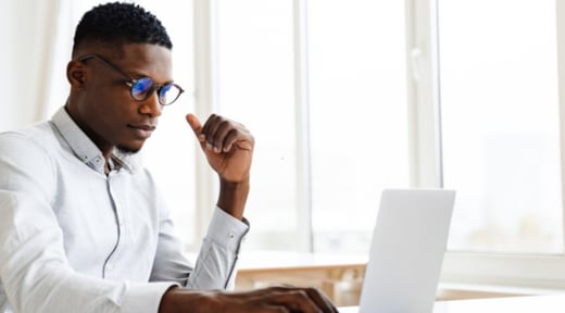 Professional-Working-on-Laptop-1600-600