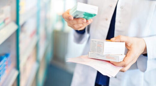 pharmacist-holding-medication (1)